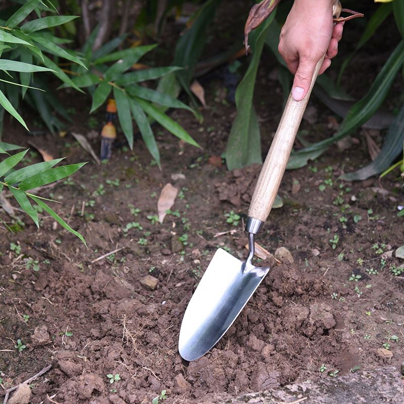 Long handled garden trowel function